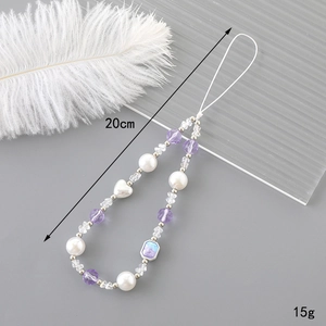 Dragonne de téléphone élégante de 20cm avec perles et cœur pour caméras et sacs