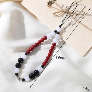 Handmade 19cm red agate style beaded phone charm strap with elegant silver floral accent
