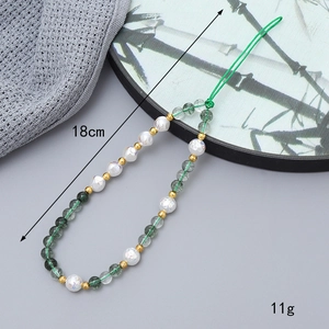 Handmade beaded phone strap with green natural stone and pearls, 18cm long, 11g weight