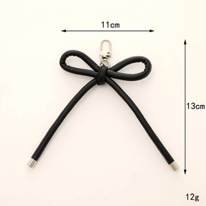 Portachiavi minimalista con fiocco in pelle PU nera e chiusura a moschettone 11x13cm
