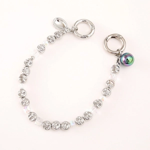 Irregular pearl style beaded wrist strap with silver skull charms and rainbow beads