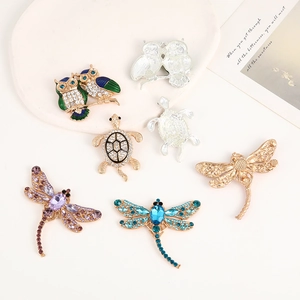 Sparkling rhinestone animal shoe charms featuring owl, turtle, and dragonfly designs