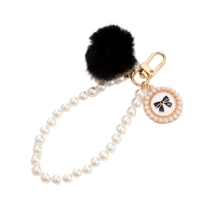 Porte-clés en perles DIY avec pompon noir et breloque dorée numéro 5 pour sac à main