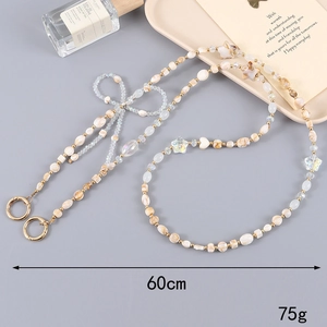 60cm beaded crossbody phone chain with cream marble beads and pearl bow charm