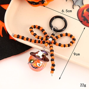 Porte-clés d'Halloween perlé avec citrouille, chapeau de sorcier et nœud papillon