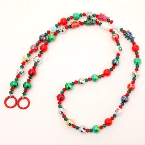 Christmas themed acrylic beaded phone lanyard with Santa and tree charms and red metal rings