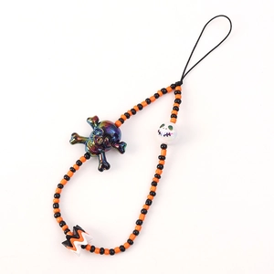 Halloween beaded phone strap with skull pumpkin charms in orange and black tones
