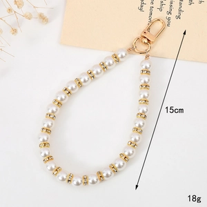 Elegant white pearl lanyard with gold rhinestone spacers and lobster clasp for keys