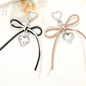 Fashion leather cord bow keychain with silver heart pendant for bags and phones