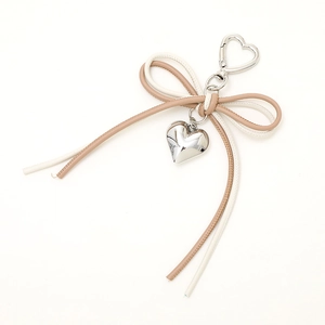 Elegant leather bow pendant with silver heart charm and metal spring clasp for phones