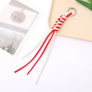 Handcrafted red and white braided PU leather keychain with silver circular spring clasp