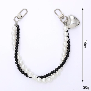 Double-layered pearl beaded strap with black and white beads and silver heart pendant