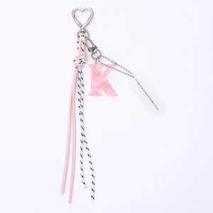 Fashion woven keychain with pink marble letter K, leather tassel, and silver heart clasp