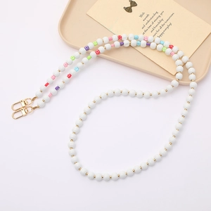Colorful smiley face beaded phone lanyard with white wooden beads and gold clasps