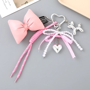 Bijou de sac à nœud rose avec perles, pendentif cœur et porte-clé chien ballon