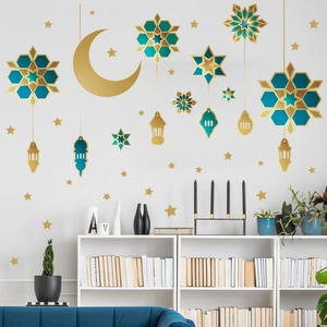 Golden crescent moon and blue star wall stickers for Ramadan home decoration on white wall