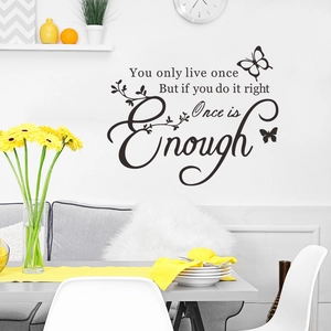 You Only Live Once wall decal with butterfly accents in a modern dining room setting