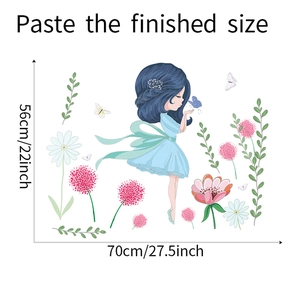 Detailed view of fairy wall sticker showing final dimensions of 56cm by 70cm on white wall