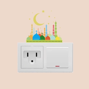 Detail of colorful Muslim moon and castle wall sticker applied over a white light switch