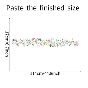 Detailed measurement showing colorful flower wall sticker sizing 114cm by 17cm