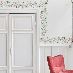 Detail showing floral vine wall stickers as door frame edging and room waistline decoration