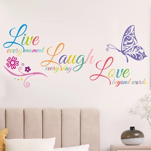 Colorful Live Laugh Love wall decals with butterflies and floral vine decorations for bedroom