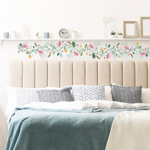 Colorful floral wall sticker with pink and yellow flower buds and green leaf vines