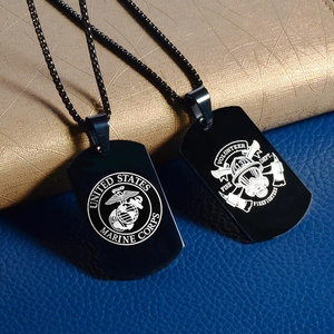 Black stainless steel dog tag necklaces featuring USMC and Volunteer Firefighter designs