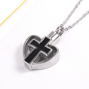 Polished heart cremation urn necklace with black cross pendant in stainless steel