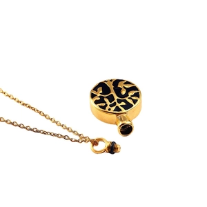 Golden Tree of Life cremation necklace pendant with black enamel finish and screw opening