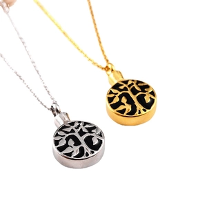 Tree of Life cremation urn necklace set in gold and silver stainless steel finish