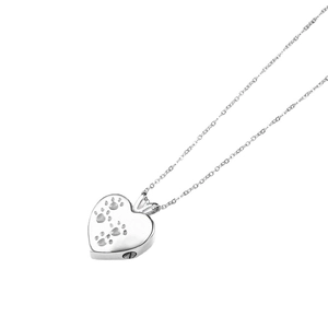 Collana a cuore in acciaio inox per ceneri di animali con incisione di impronte di cane