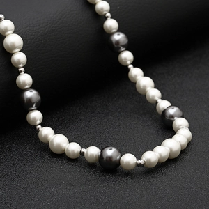 Hip-hop style necklace featuring white and grey shell pearls with metallic spacer beads