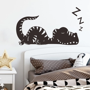Sticker mural silhouette de dinosaure endormi pour décoration chambre d'enfant