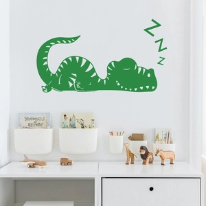 Sticker mural dinosaure vert endormi pour décoration de chambre d'enfant