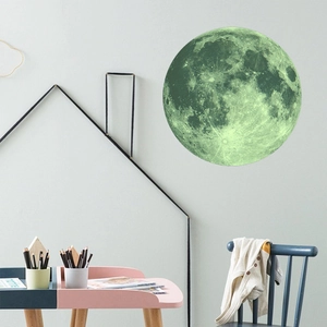 Glow-in-the-dark moon wall decal with detailed lunar surface for children's room decoration