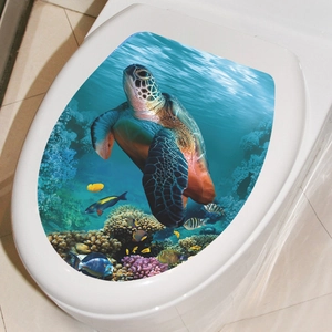 Detail view of waterproof toilet seat decal featuring sea turtle and coral reef patterns