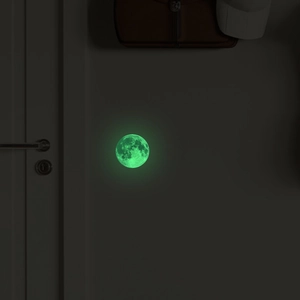 Luminous moon wall sticker showing realistic lunar texture and bright green glow in the dark