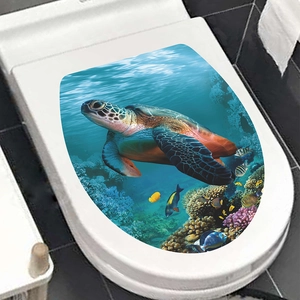 Macro view of 3D ocean toilet lid sticker with sea turtles and colorful coral reef