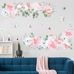 Floral wall stickers featuring pink roses and butterflies in a modern living room