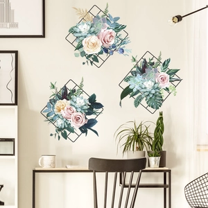 Detail view of pink peony flower wall stickers with black diamond mesh and succulents