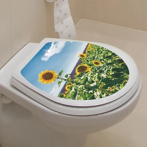 Self-adhesive toilet lid sticker featuring a vibrant sunflower field under a blue sky