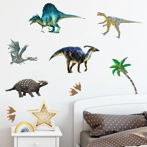 Detail view of colorful cartoon dinosaur wall stickers on a white bedroom wall