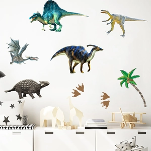 Detailed view of colorful cartoon dinosaur and palm tree wall decals for nursery decor