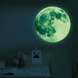 Luminous moon wall sticker showing realistic 3D lunar surface texture in glow green