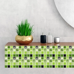 Modern green mosaic peel and stick tile wall stickers displayed on a wooden cabinet shelf