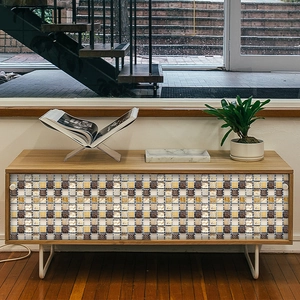 Brown mosaic style self-adhesive wall tile stickers applied on a modern cabinet surface