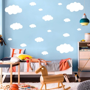 White cloud wall stickers set for kids bedroom decor on a light blue background