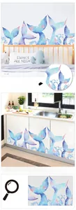 Detail of watercolor mermaid tail wall sticker with blue and purple gradients for kids room