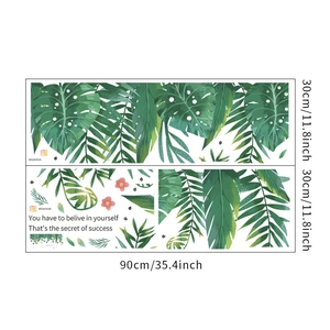 Detail von 30x90cm Wandstickern mit tropischen Palmen und Monstera-Blättern und Zitat